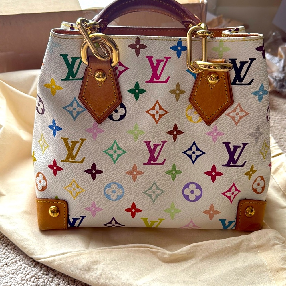 Louis Vuitton Multicolor Monogram Clutch